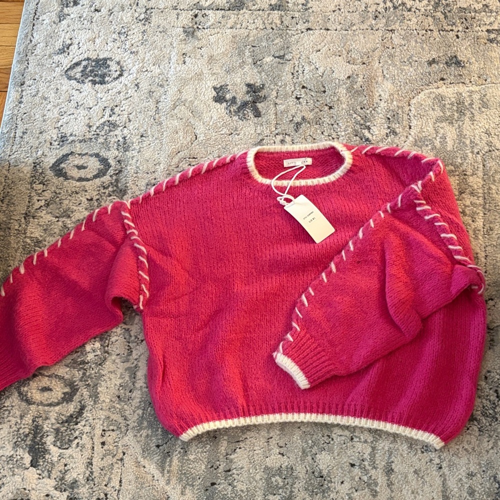 Vibrant Pink Crew Neck Sweater with White Accents